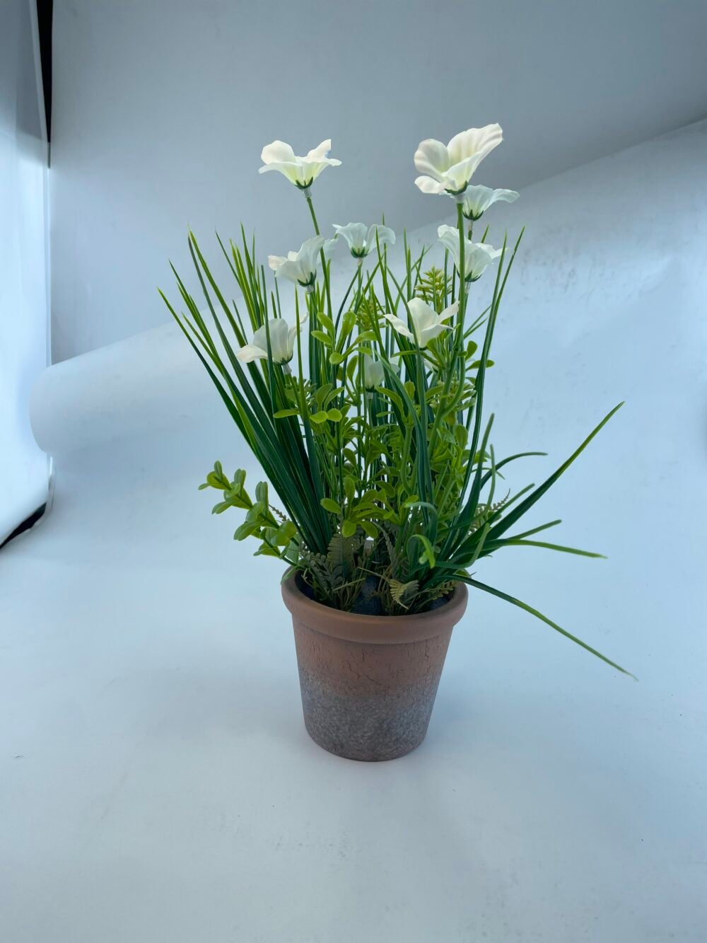 PLASITC FLOWER WITH BRICK-RED PULP POT