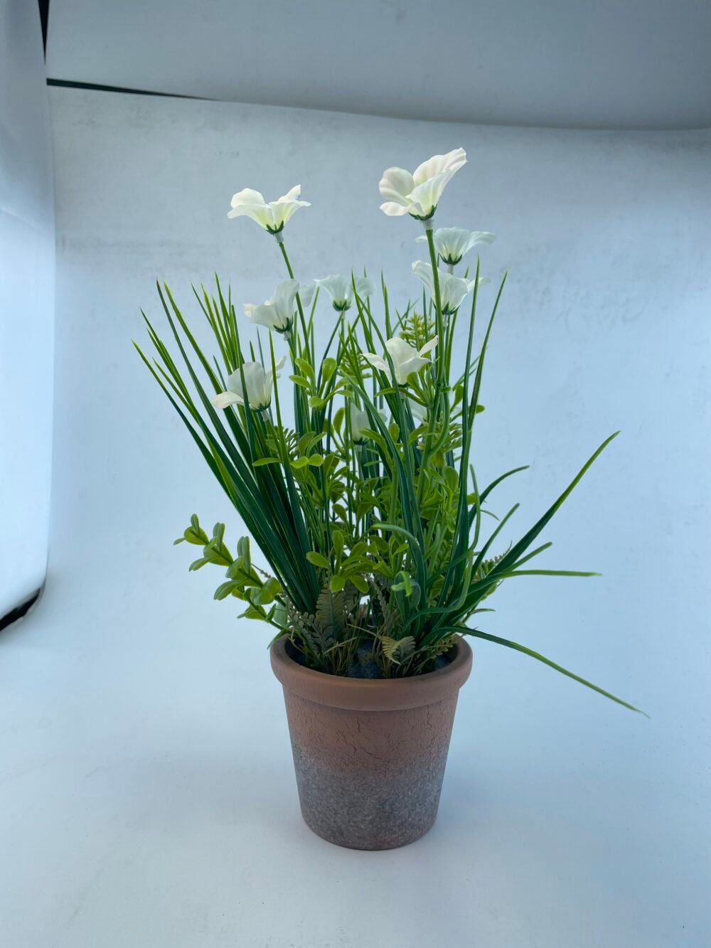 PLASITC FLOWER WITH BRICK-RED PULP POT